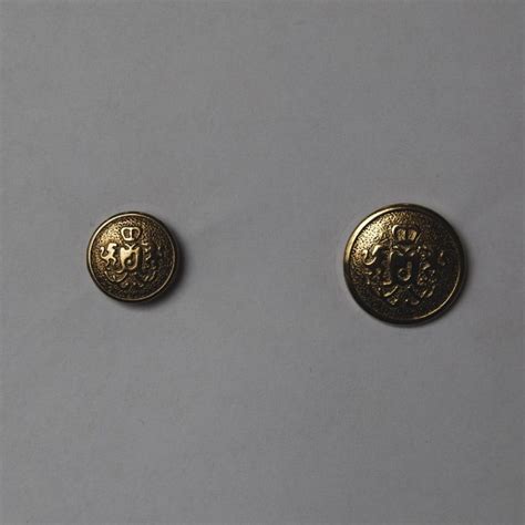 gold metal lion clamp for fabric|Antique Gold Lion Shield Metal Buttons .